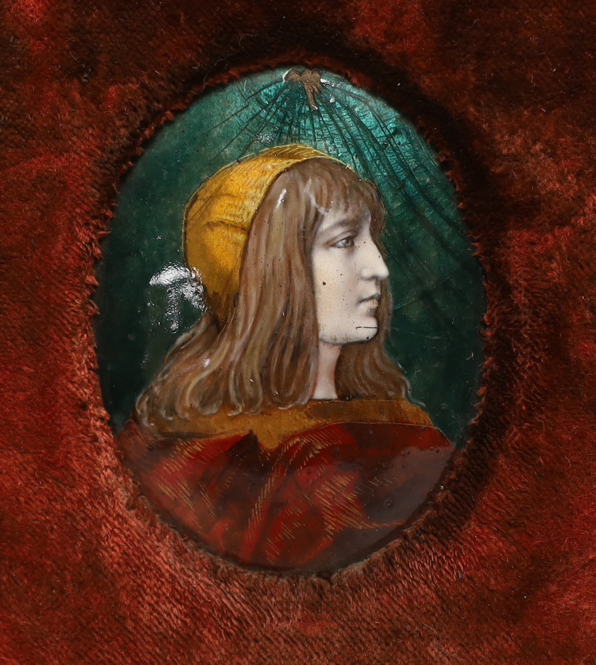 A Limoges oval enamelled plaque of a medieval girl, signed to the reverse, E. Blanchez, framed, overall 21 x 17cm